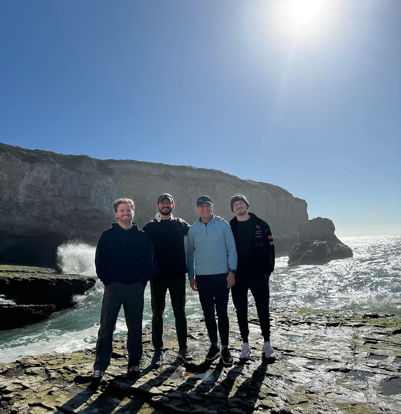Bryan with friends at the beach cliffs